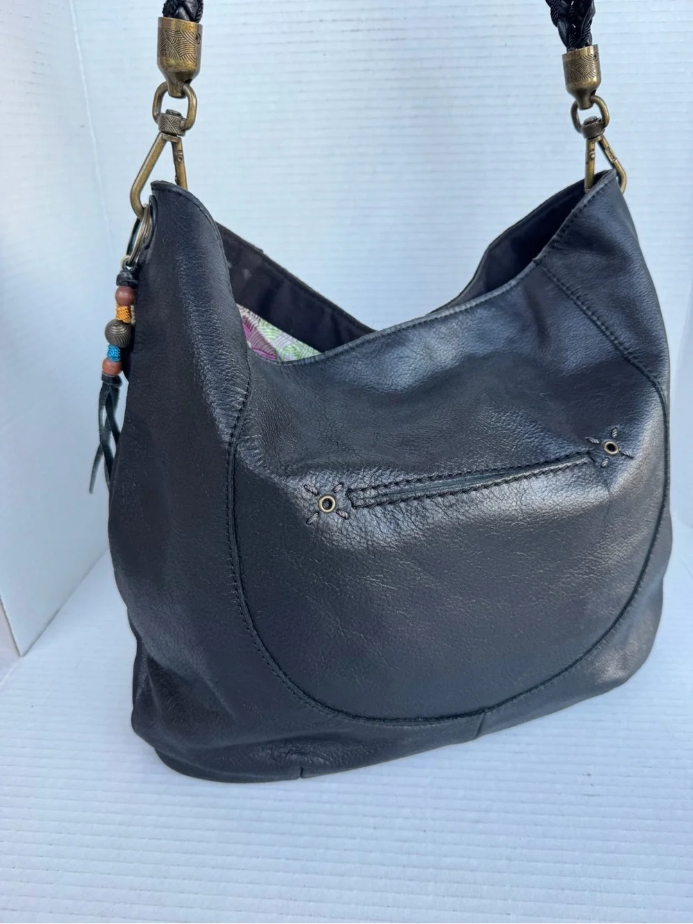 The Sak Black Leather Hobo Bag Braided Strap & Tassel Charm